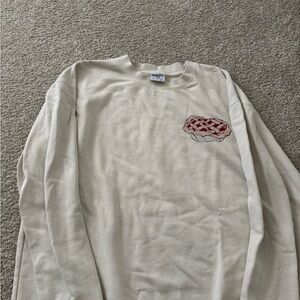 Cream Sweatshirt with Red Pie Design